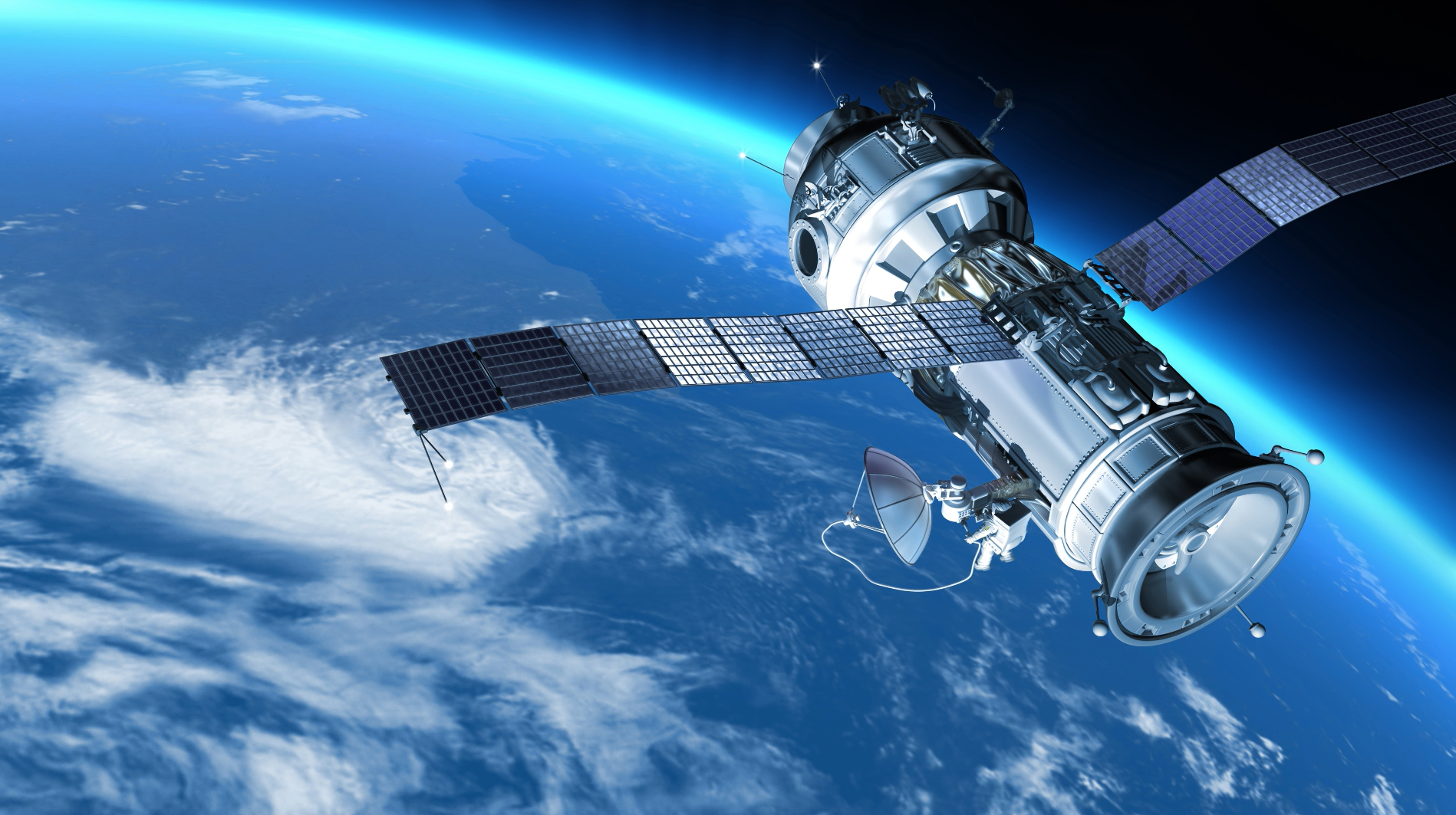image d'un satellite vu de l'espace au dessus de la Terre